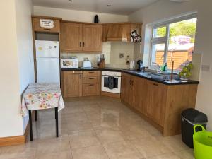 Imagen de la galería de Beach View Heights Dugort Achill Eircode F28E8D9, en Doogort