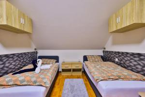 Postel nebo postele na pokoji v ubytování H17