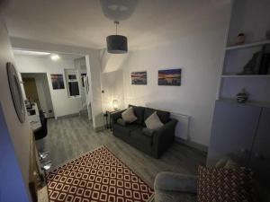 Χώρος καθιστικού στο Two bed holiday home in Conwy