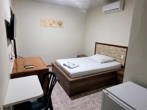 Postel nebo postele na pokoji v ubytování Hotel Serra do Mar