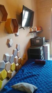 TV a/nebo společenská místnost v ubytování Triesti Home