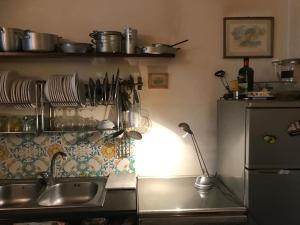 Η κουζίνα ή μικρή κουζίνα στο Casa Amedeo
