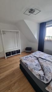 Postel nebo postele na pokoji v ubytování Ferienwohnung bei Natie