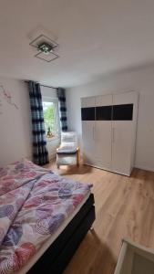 Postel nebo postele na pokoji v ubytování Ferienwohnung bei Natie