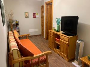 TV a/nebo společenská místnost v ubytování Apartamento Playa Chica