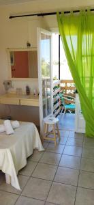 Posezení v ubytování Cleo Rooms 250m from the beach