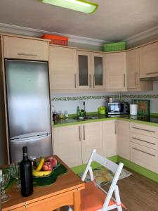 Kuchyň nebo kuchyňský kout v ubytování Apartamento Playa Chica