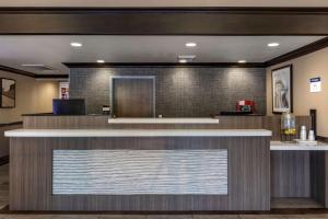 a kitchen with a stainless steel counter top at Best Western Plus Las Vegas West in Las Vegas