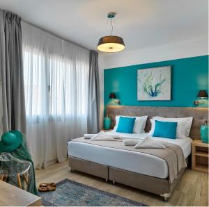 Ein Bett oder Betten in einem Zimmer der Unterkunft Acropolis City Life BH