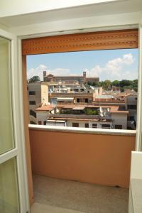 Balkón alebo terasa v ubytovaní MIGDAL Luxury Suites Roma Testaccio