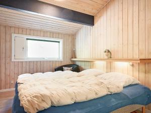 Lova arba lovos apgyvendinimo įstaigoje Holiday home Nexø XLI