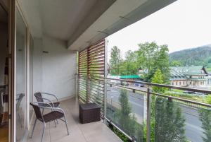 A balcony or terrace at Prestige Apartamenty Stara Polana & SPA2