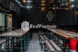 Restaurant o un lloc per menjar a Jabrix Hotel Mitra RedDoorz