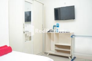 Televisor o centre d'entreteniment de Jabrix Hotel Mitra RedDoorz