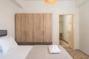 Postel nebo postele na pokoji v ubytování Crescendo City House