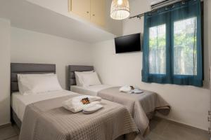 Postel nebo postele na pokoji v ubytování Crescendo City House