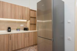 Kuchyň nebo kuchyňský kout v ubytování Crescendo City House
