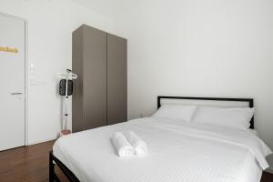 Ένα ή περισσότερα κρεβάτια σε δωμάτιο στο Una serviced Apartment +38 φωτογραφίες