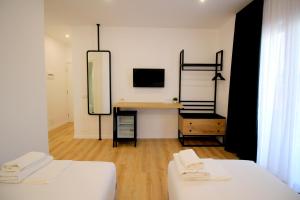 Postel nebo postele na pokoji v ubytování Hotel Qurku 2