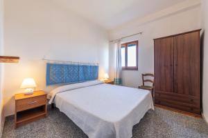 Postel nebo postele na pokoji v ubytování Villetta immersa nella Natura