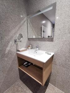 Kylpyhuone majoituspaikassa Aux Ateliers