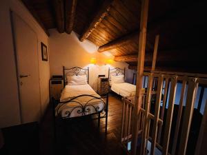 Posteľ alebo postele v izbe v ubytovaní Locanda del Sole