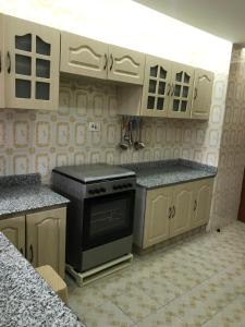 Kuchyň nebo kuchyňský kout v ubytování Maliaways Comfy Airbnb-Jkia
