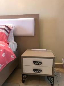 Postel nebo postele na pokoji v ubytování Maliaways Comfy Airbnb-Jkia