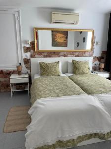 En eller flere senge i et værelse på Bungalow 2-4 Playa del Inglés with Jacuzzi