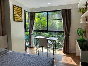 Posezení v ubytování Dusit Grand Park Condo