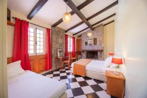Postel nebo postele na pokoji v ubytování Le Relais Des Cimes