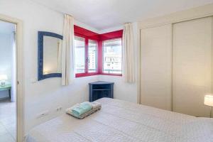 Łóżko lub łóżka w pokoju w obiekcie Inftour Amatista 9 Apartamento
