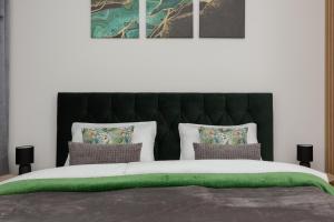 Posteľ alebo postele v izbe v ubytovaní Cozy Studio Żupnicza Soho Factory by Noclegi Renters