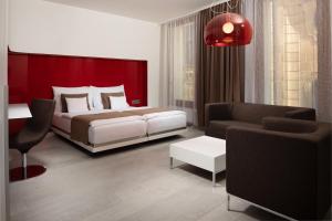 Posteľ alebo postele v izbe v ubytovaní OREA Hotel Arigone Olomouc