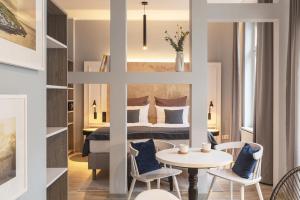 Ein Bett oder Betten in einem Zimmer der Unterkunft acora City Apart Living the City - Apartments