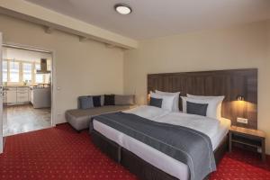 Ein Bett oder Betten in einem Zimmer der Unterkunft acora City Apart Living the City - Apartments