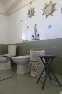 Kúpeľňa v ubytovaní Halawa Room Giardini Naxos