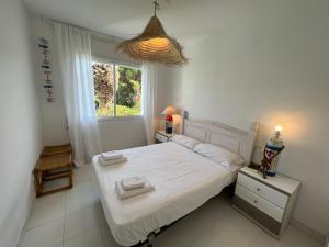 A bed or beds in a room at MP - Green Club 204