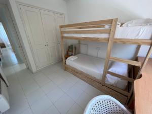A bed or beds in a room at MP - Green Club 204