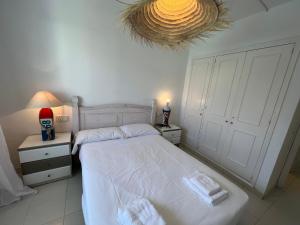 A bed or beds in a room at MP - Green Club 204