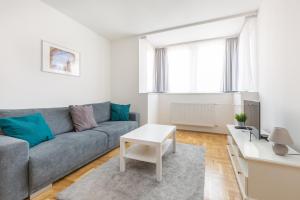 Posedenie v ubytovaní Cozy 3-bedroom Apartment in the Heart of Budapest