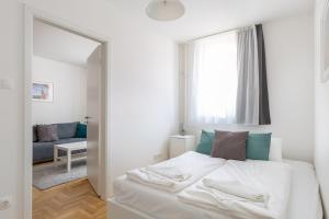 Posteľ alebo postele v izbe v ubytovaní Cozy 3-bedroom Apartment in the Heart of Budapest