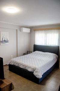 Postel nebo postele na pokoji v ubytování Filip and Sofi Apartment