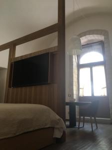 TV a/nebo společenská místnost v ubytování GAPO Rooms
