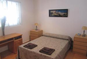 A bed or beds in a room at Casa Buenavista Még 21 kép