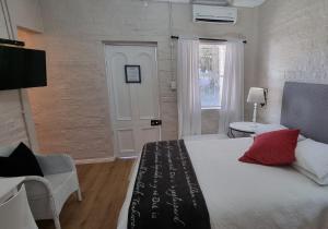 Postel nebo postele na pokoji v ubytování Rietjiesbos Self Catering