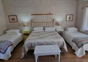 Postel nebo postele na pokoji v ubytování Rietjiesbos Self Catering