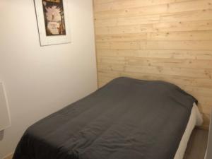 appartement 10 couchages le lioran bord rando/ski房間的床