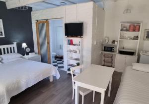 Postel nebo postele na pokoji v ubytování Rietjiesbos Self Catering