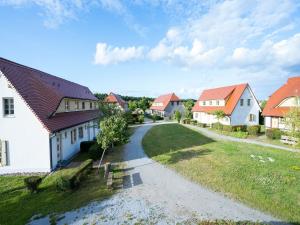 a small village with houses and a road at Feriendorf Rugana - Klassik Appartement mit 1 Schlafzimmer D16 in Dranske